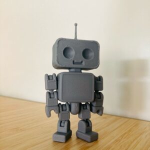 Robô Articulado Fofo: O Futuro da Decoração Geek na sua Mesa
